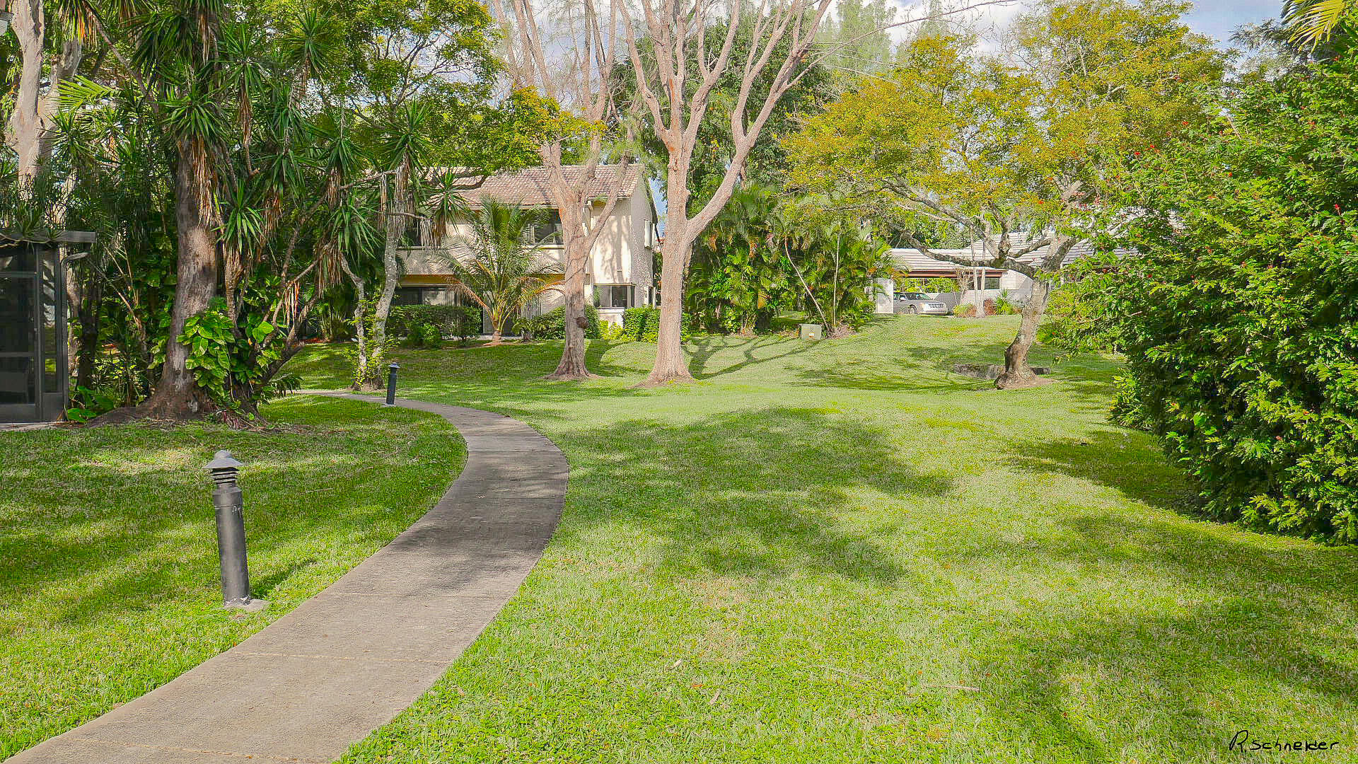 5535 Constant Spring Terrace, Unit 216 Lauderhill, FL 33319 - Photo 46 of 51 a view of a park with large trees