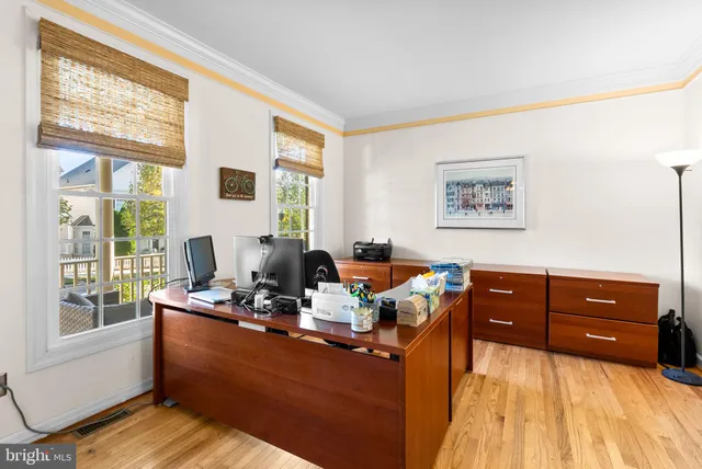 a room with furniture window and wooden floor