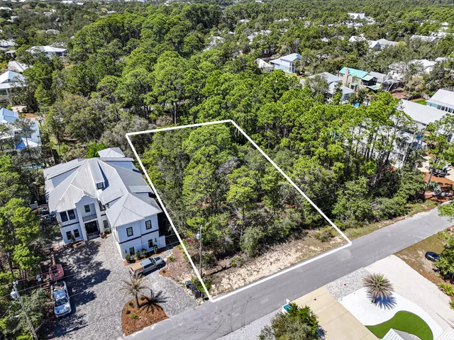 a view of a roof and sitting area