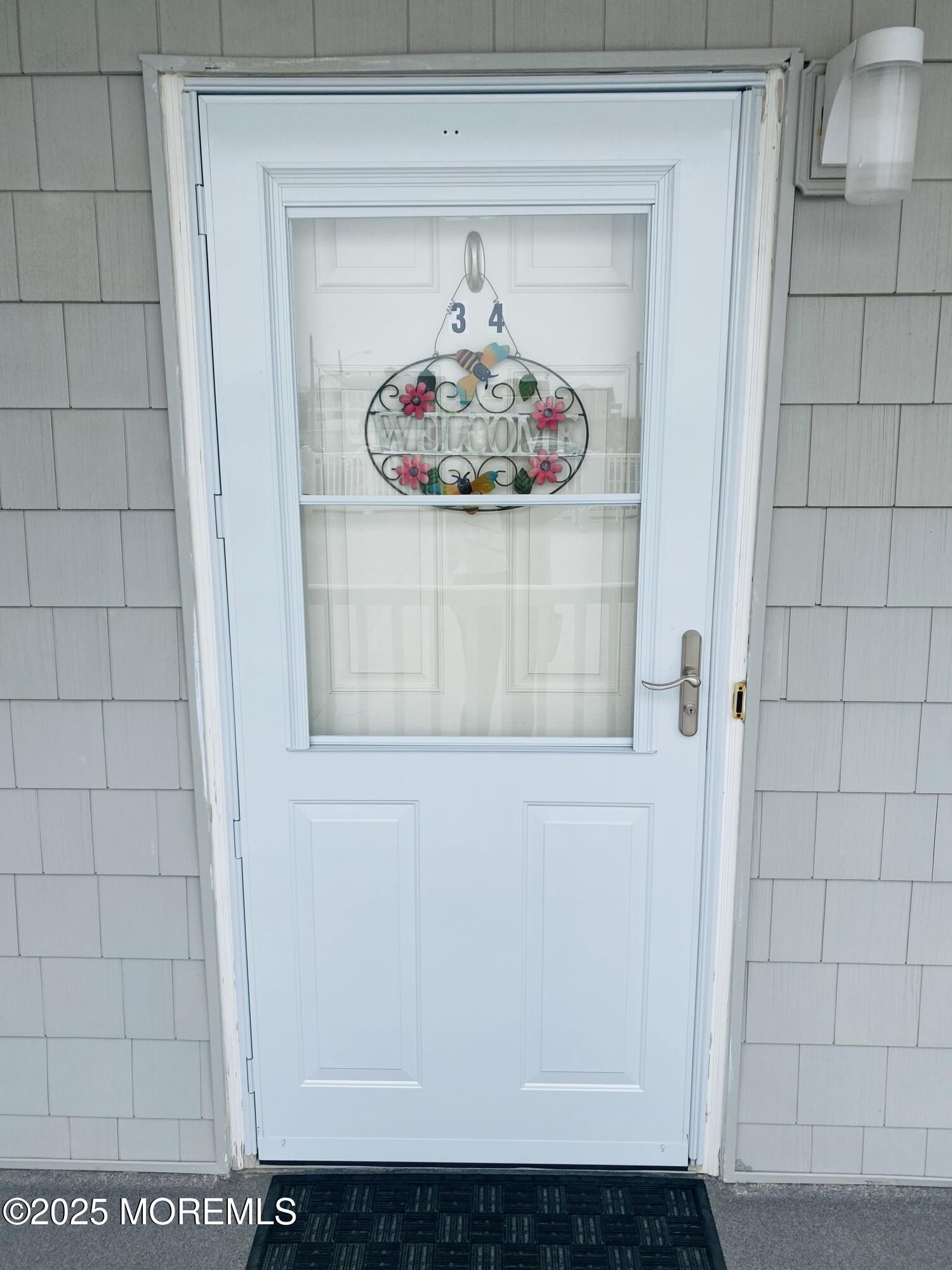 1 2nd Avenue, Unit 34 Seaside Heights, NJ 08751 - Photo 14 of 19 a view of wooden door