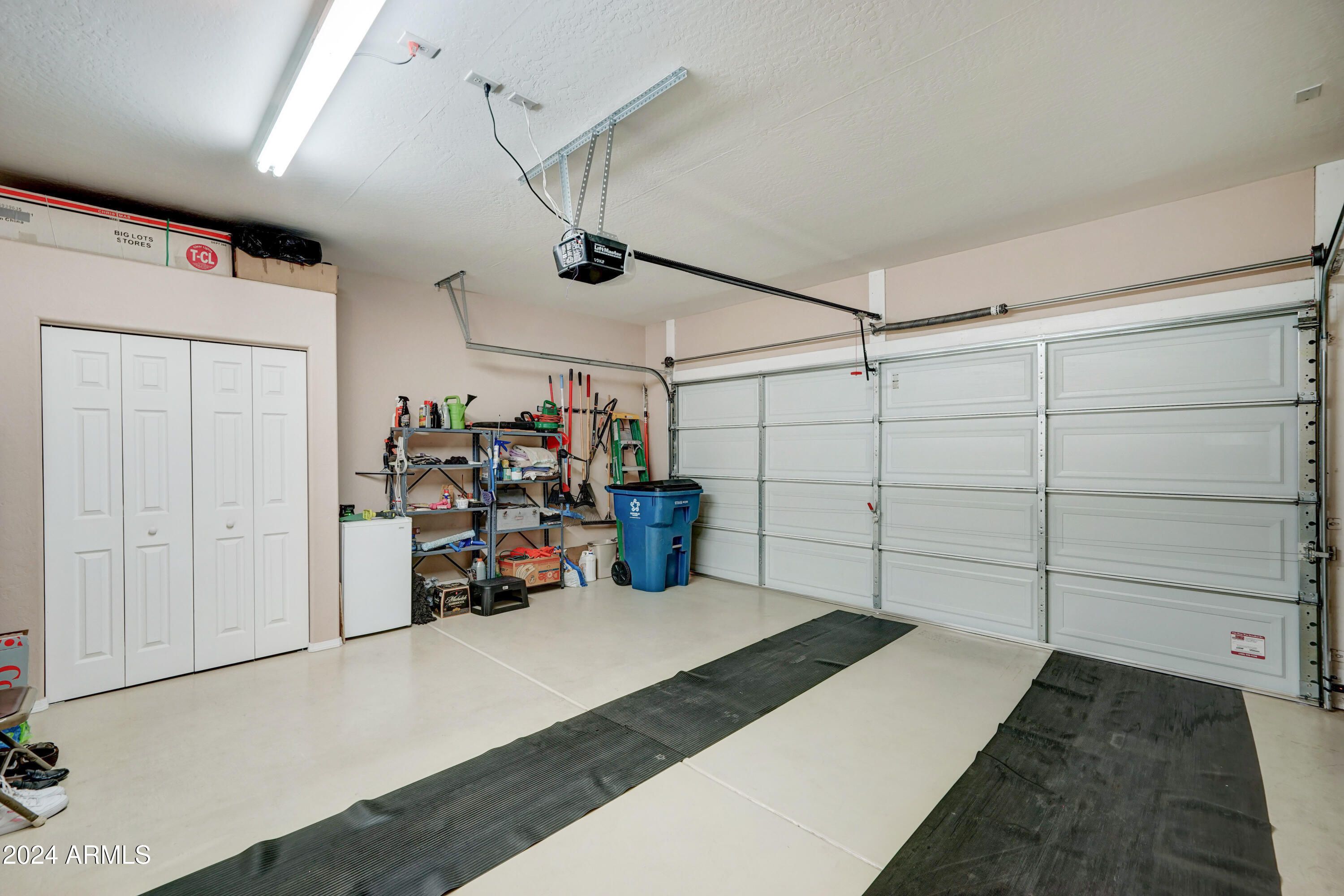 2101 South Meridian Road, Unit 131 Apache Junction, AZ 85120 - Photo 15 of 59 a view of a garage with storage