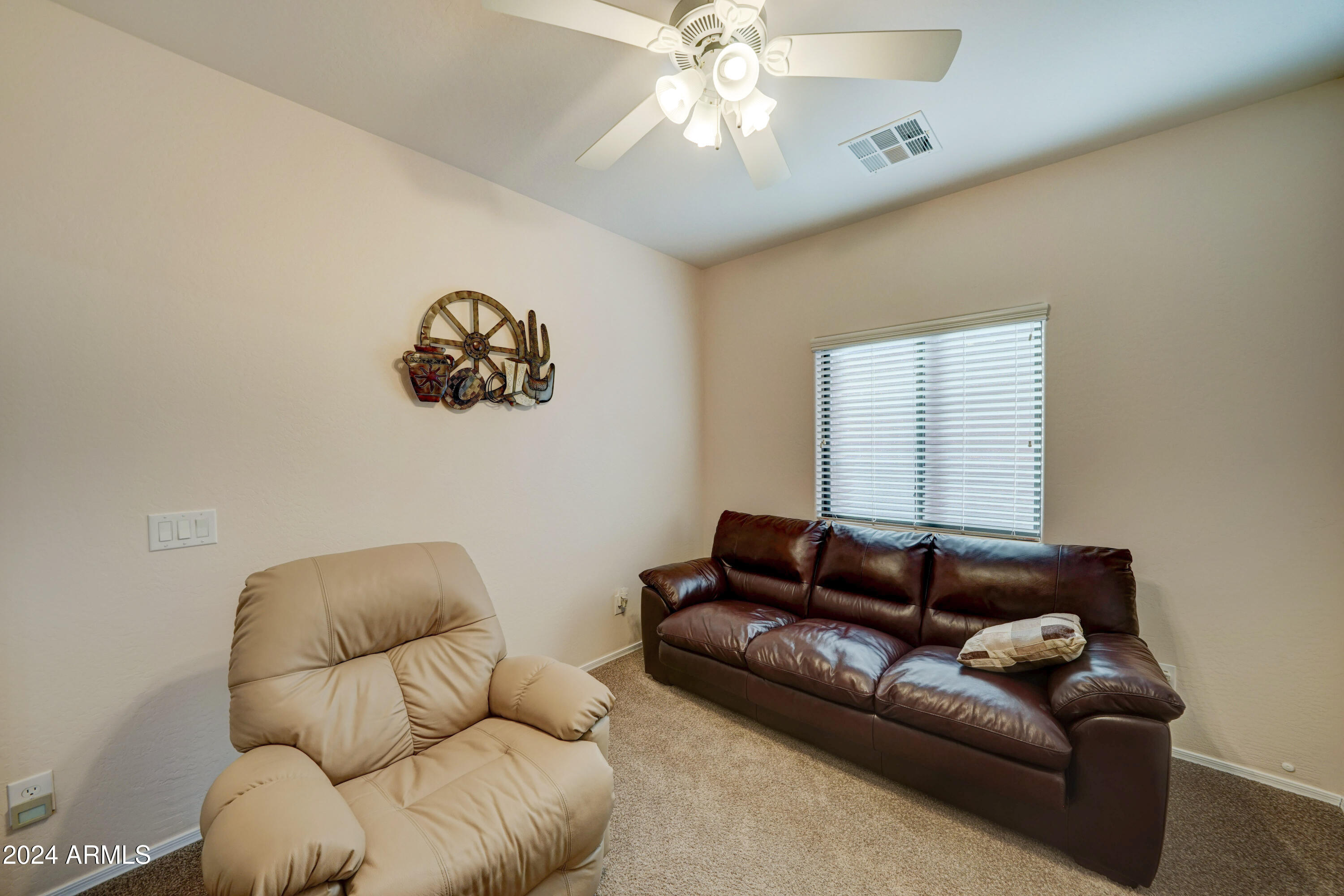 2101 South Meridian Road, Unit 131 Apache Junction, AZ 85120 - Photo 16 of 59 a living room with furniture and a couch