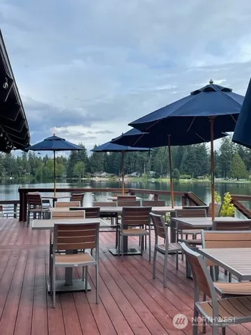 an outdoor space with furniture and umbrella