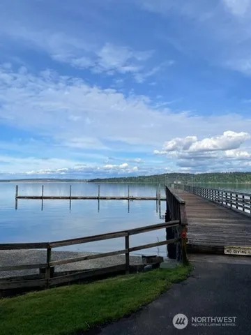 a view of a bench in front of building