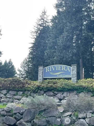 a sign that is on the side of a road