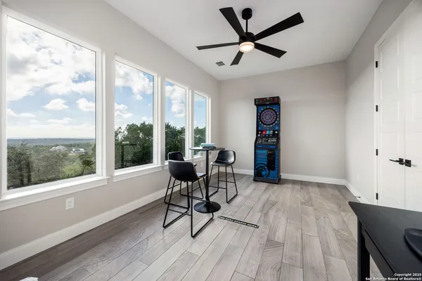 a white toilet with a shower
