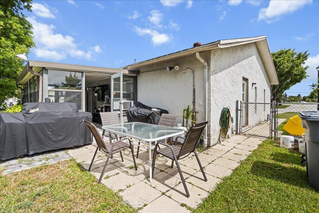 9893 Liberty Road Boca Raton, FL 33434 - Photo 16 of 20 9893 Side Patio 1