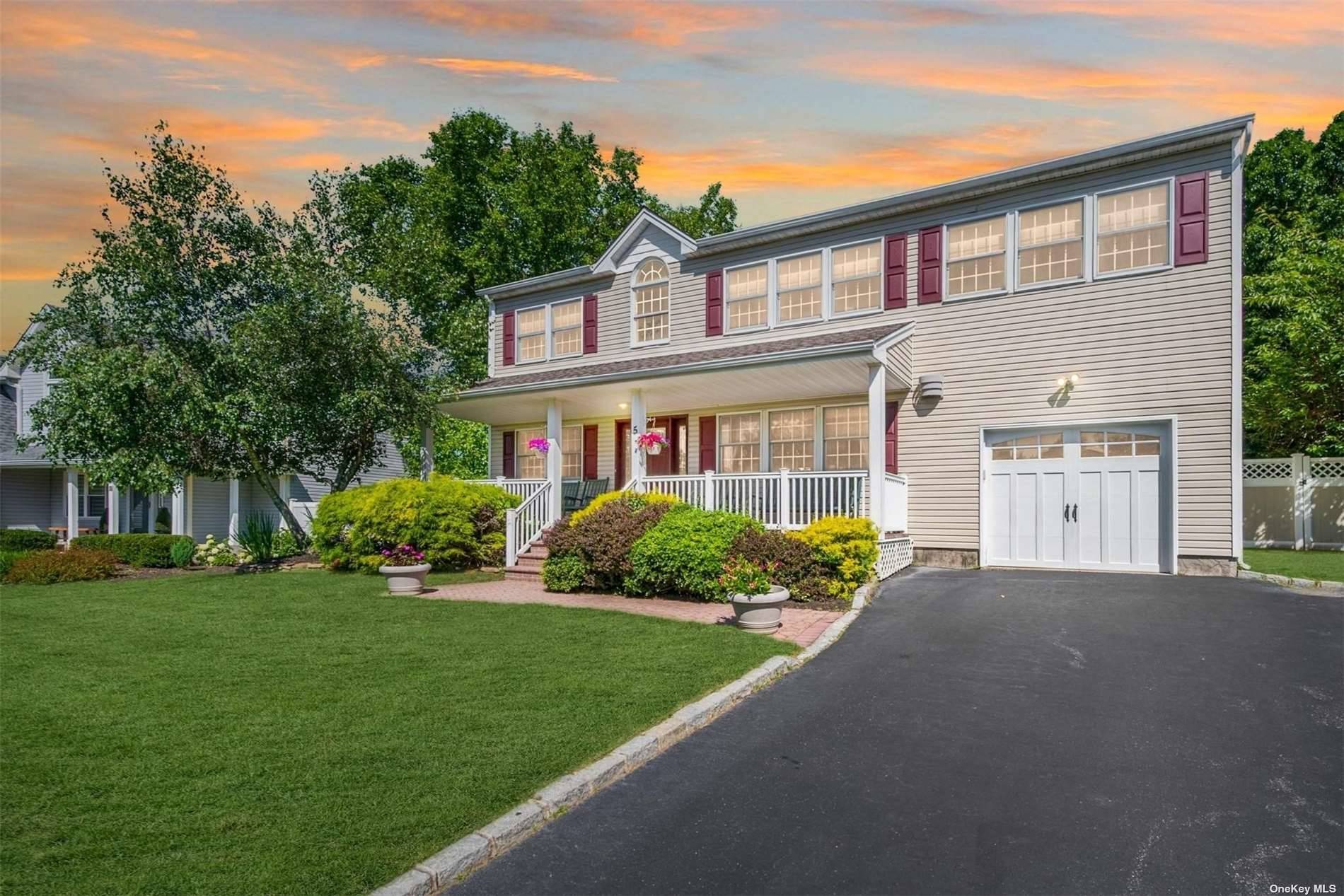 5 Max Way Commack, NY 11725 - Photo 1 of 1 a front view of a house with a yard