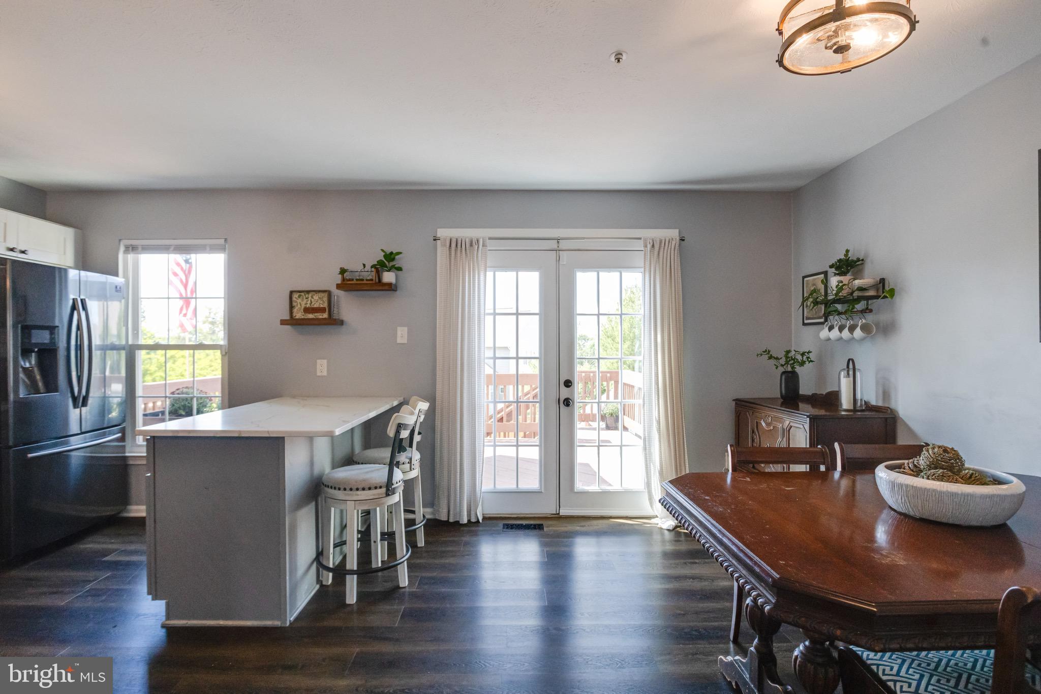 16 Sandview Court Baltimore, MD 21209 - Photo 17 of 58 a view of a dining room with furniture window and wooden floor