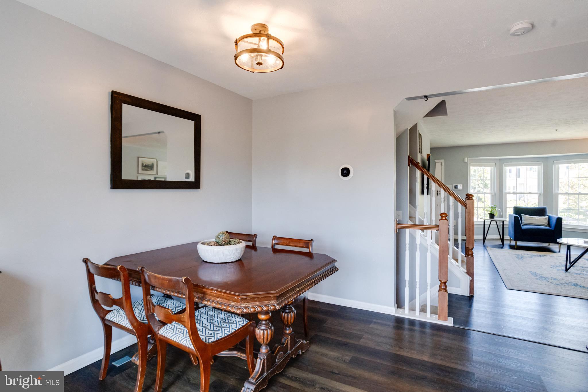 16 Sandview Court Baltimore, MD 21209 - Photo 19 of 58 a view of a dining room with furniture and wooden floor