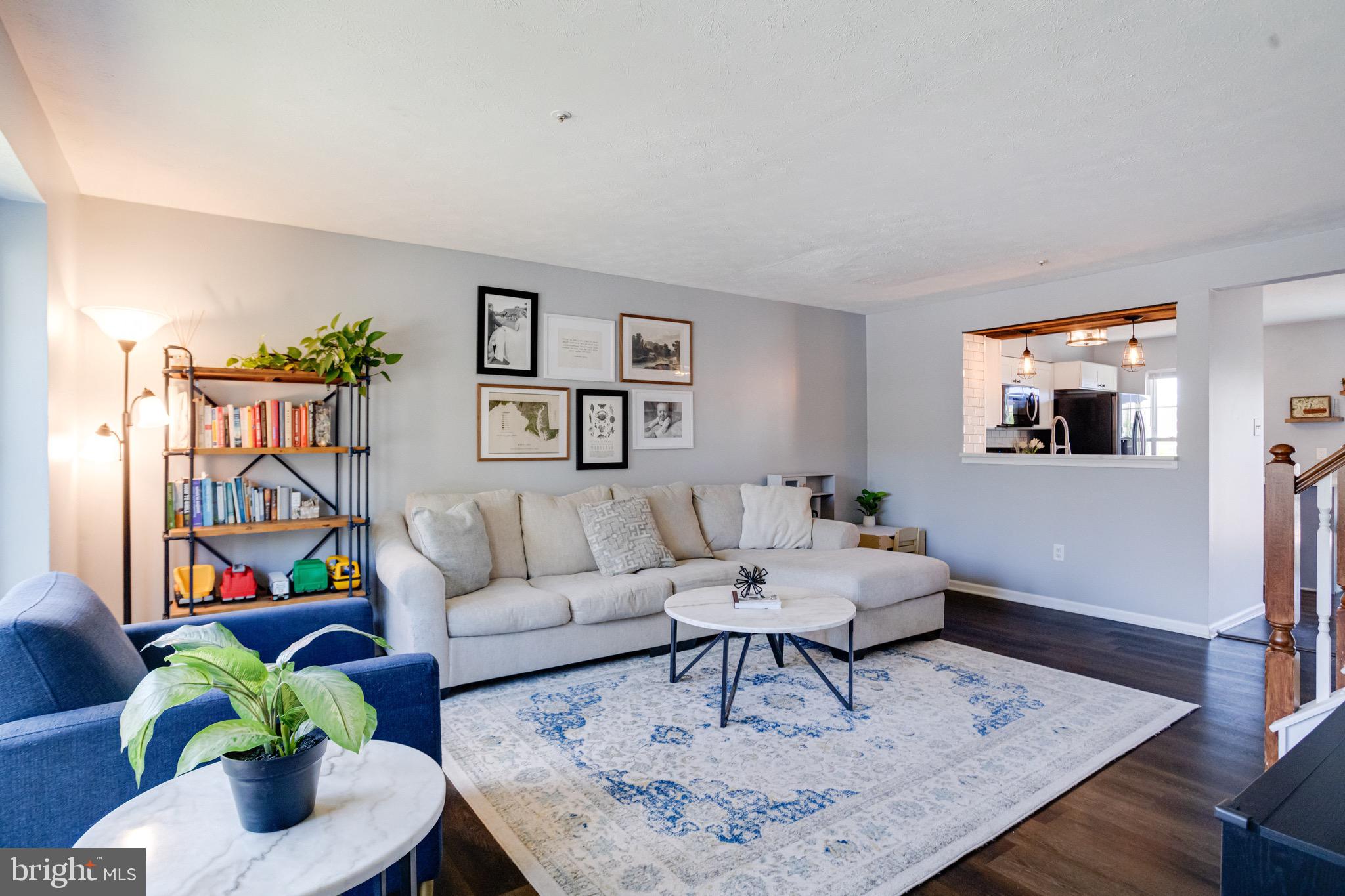 16 Sandview Court Baltimore, MD 21209 - Photo 3 of 58 a living room with furniture and wooden floor