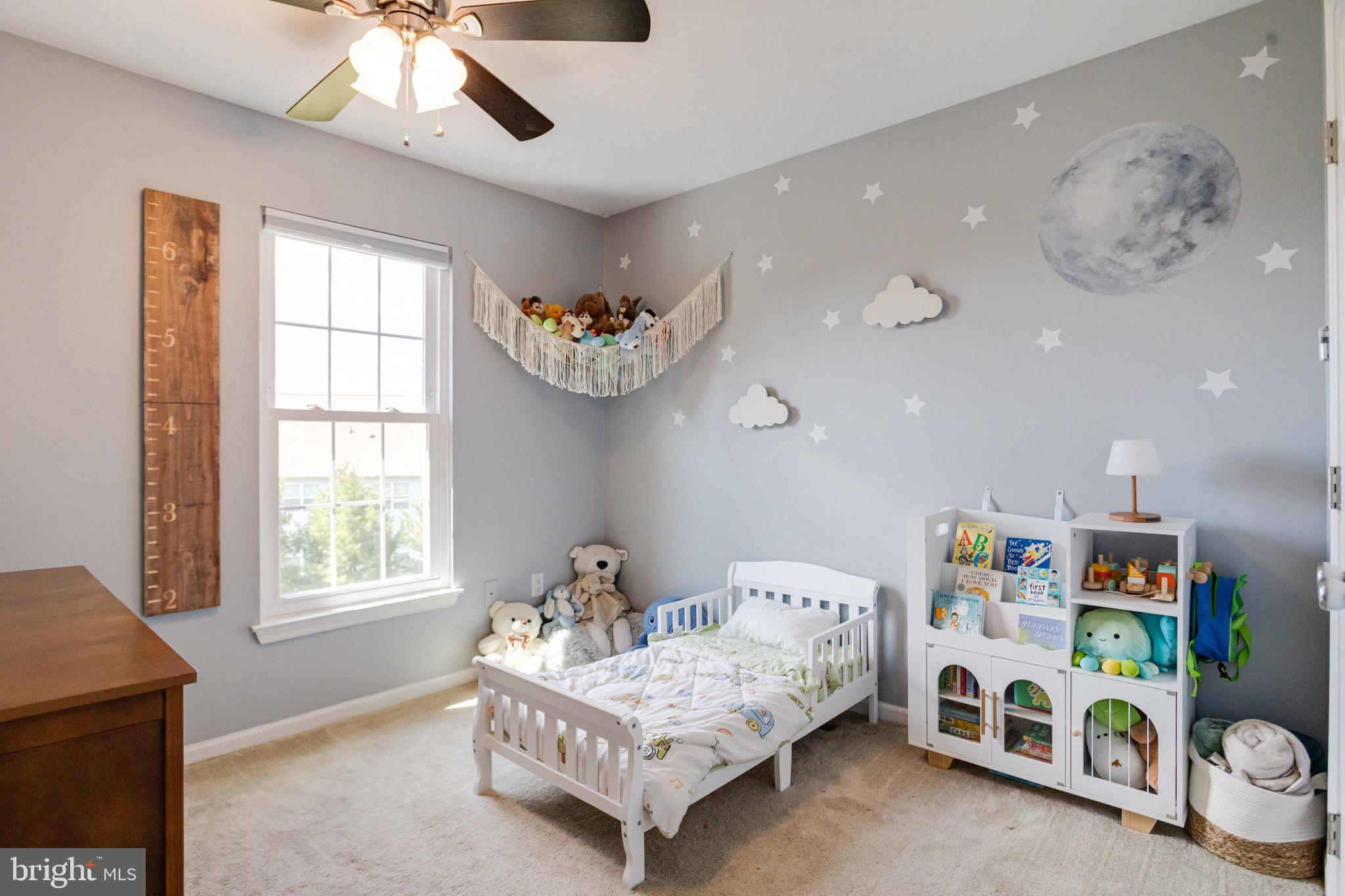 16 Sandview Court Baltimore, MD 21209 - Photo 31 of 58 a bedroom with a bed and window