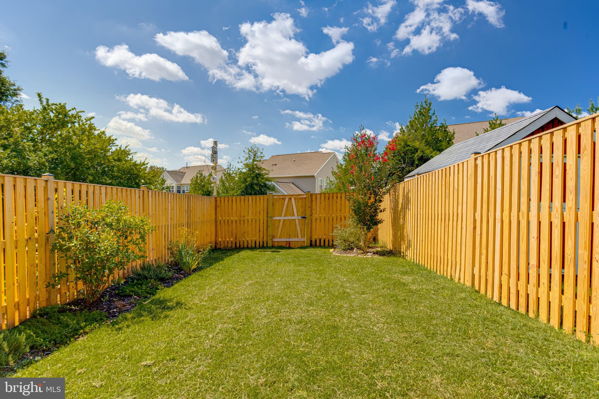 16 Sandview Court Baltimore, MD 21209 - Photo 51 of 58 a view of a garden with a flower in a garden