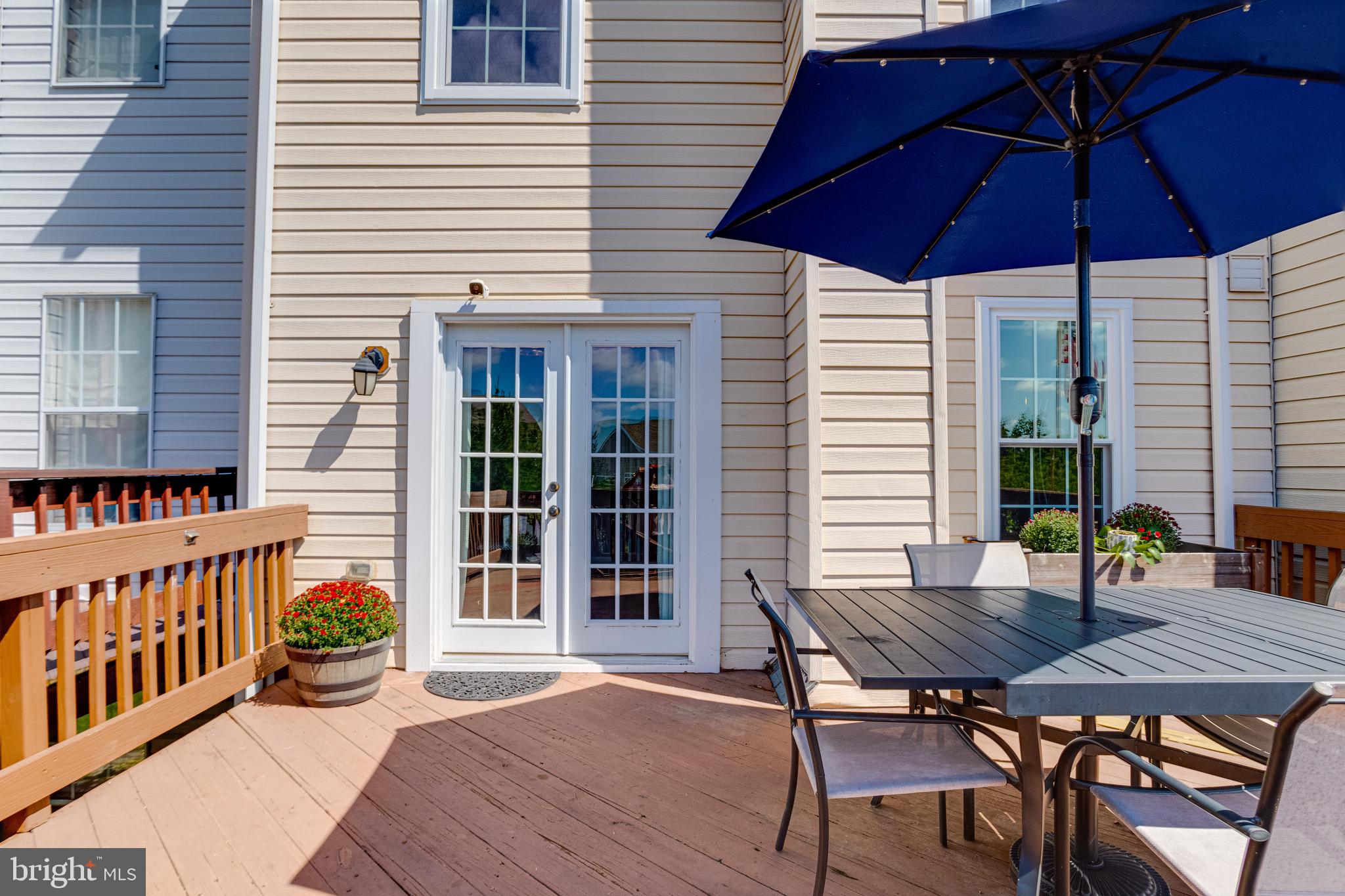 16 Sandview Court Baltimore, MD 21209 - Photo 57 of 58 a view of a house with a deck and furniture