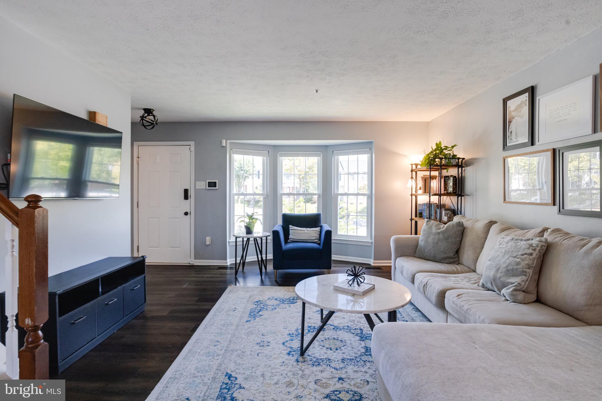 16 Sandview Court Baltimore, MD 21209 - Photo 7 of 58 a living room with furniture and wooden floor