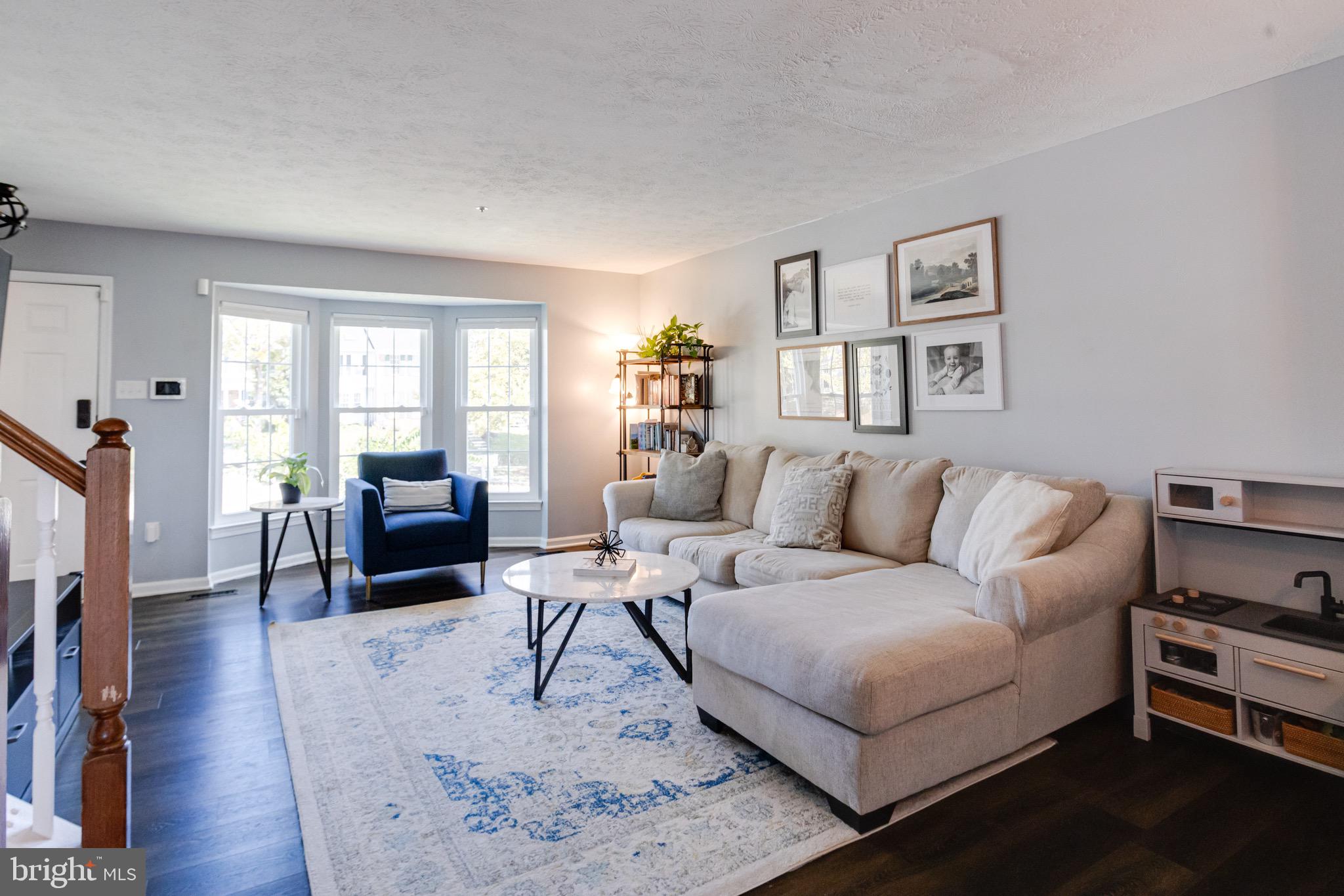 16 Sandview Court Baltimore, MD 21209 - Photo 8 of 58 a living room with furniture fireplace and a window