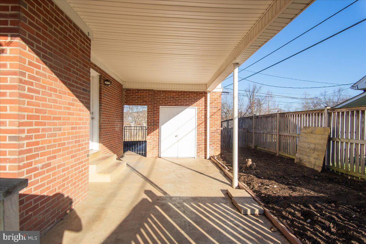 403 Delaware Road Frederick, MD 21701 - Photo 19 of 24 Carport with extra shed storage