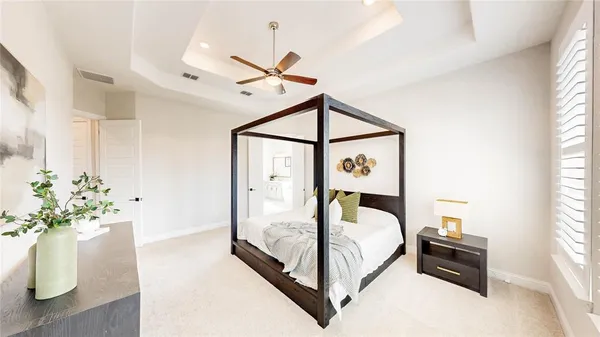 a spacious bathroom with a sink and a mirror