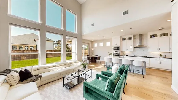 a view of a living room and dining room