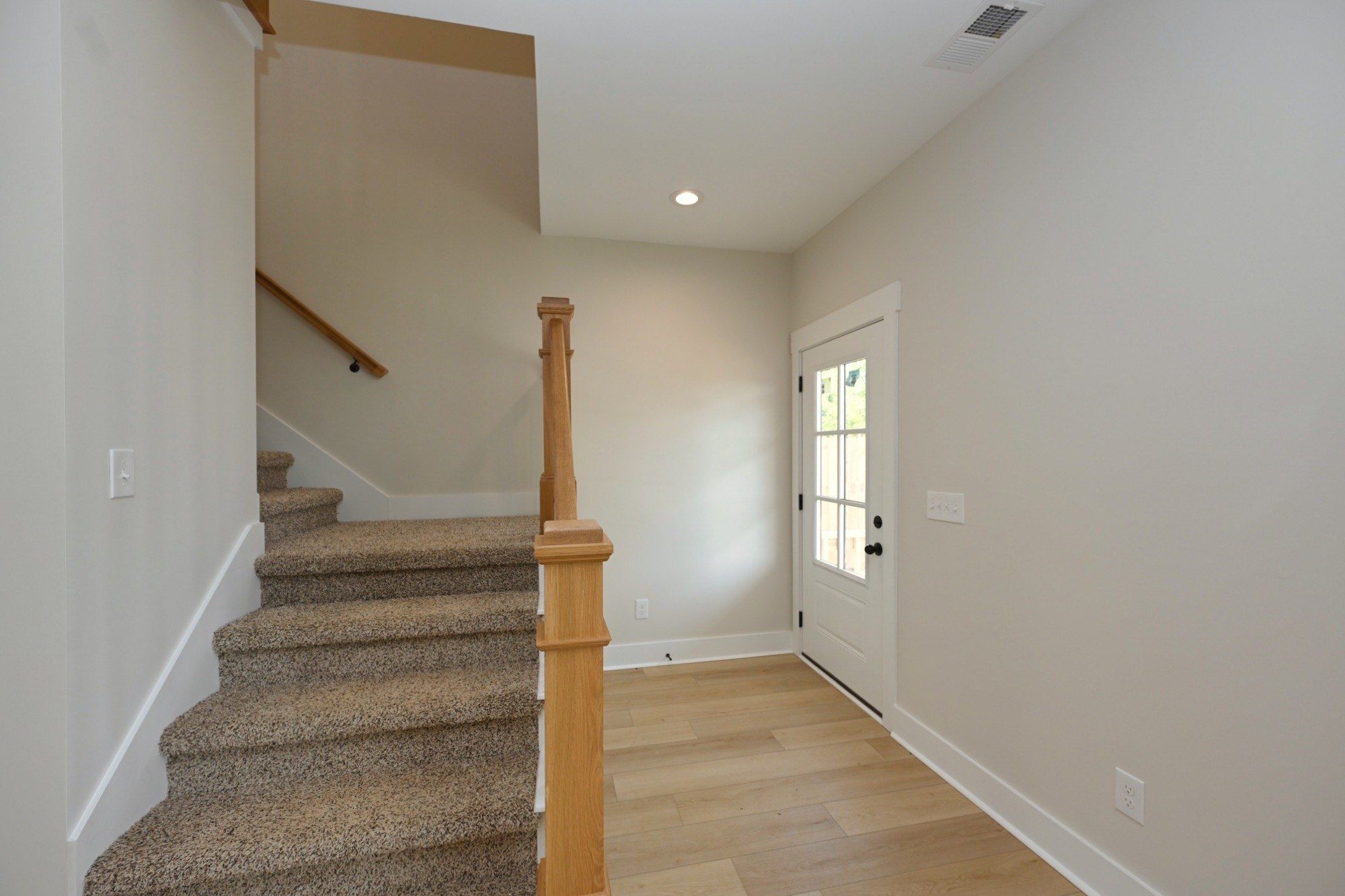 1204 Sylvia Drive Madison, TN 37115 - Photo 12 of 44 a view of entryway and hall with wooden floor