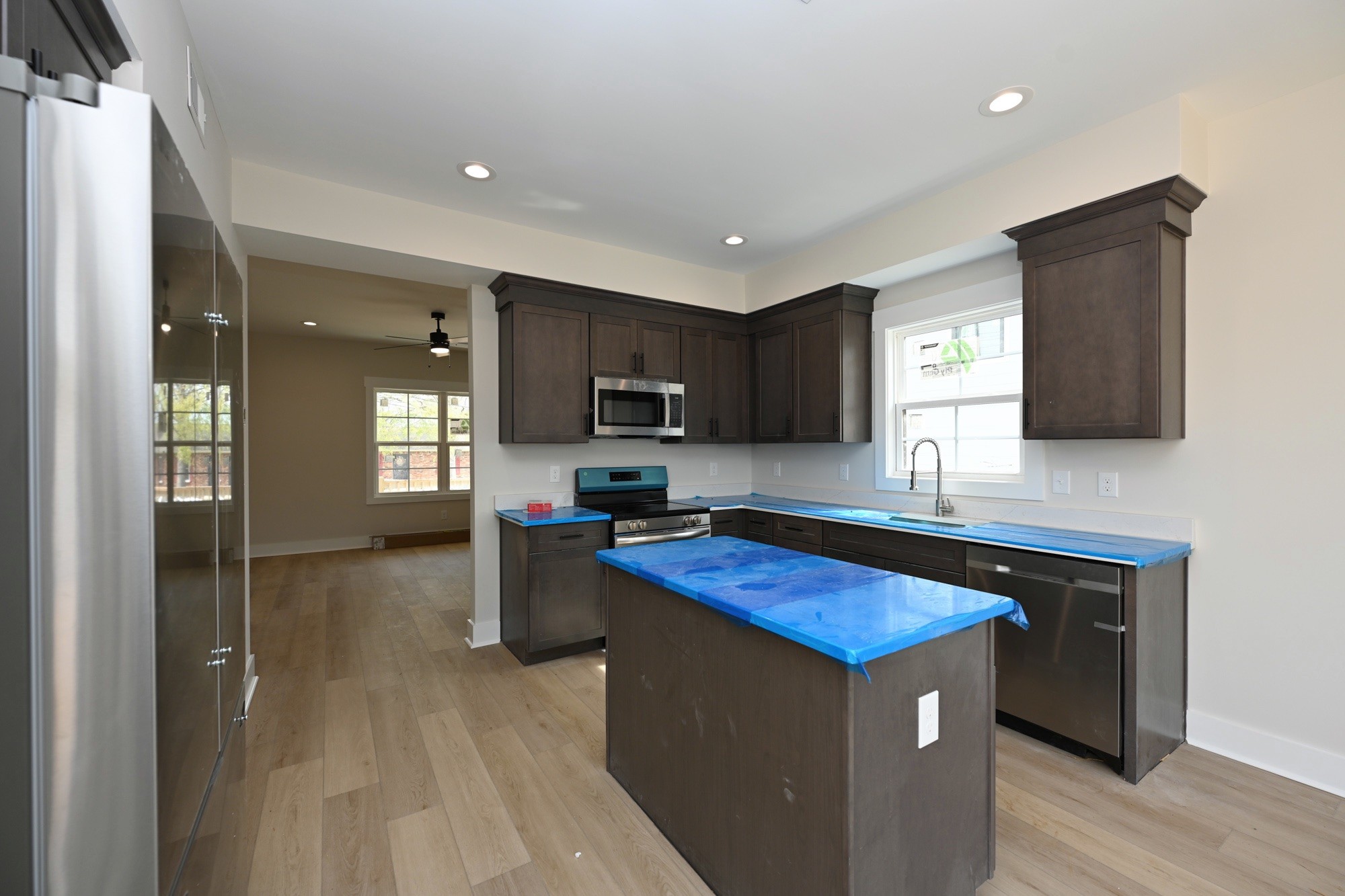 1204 Sylvia Drive Madison, TN 37115 - Photo 21 of 44 a kitchen with a stove cabinets and a sink