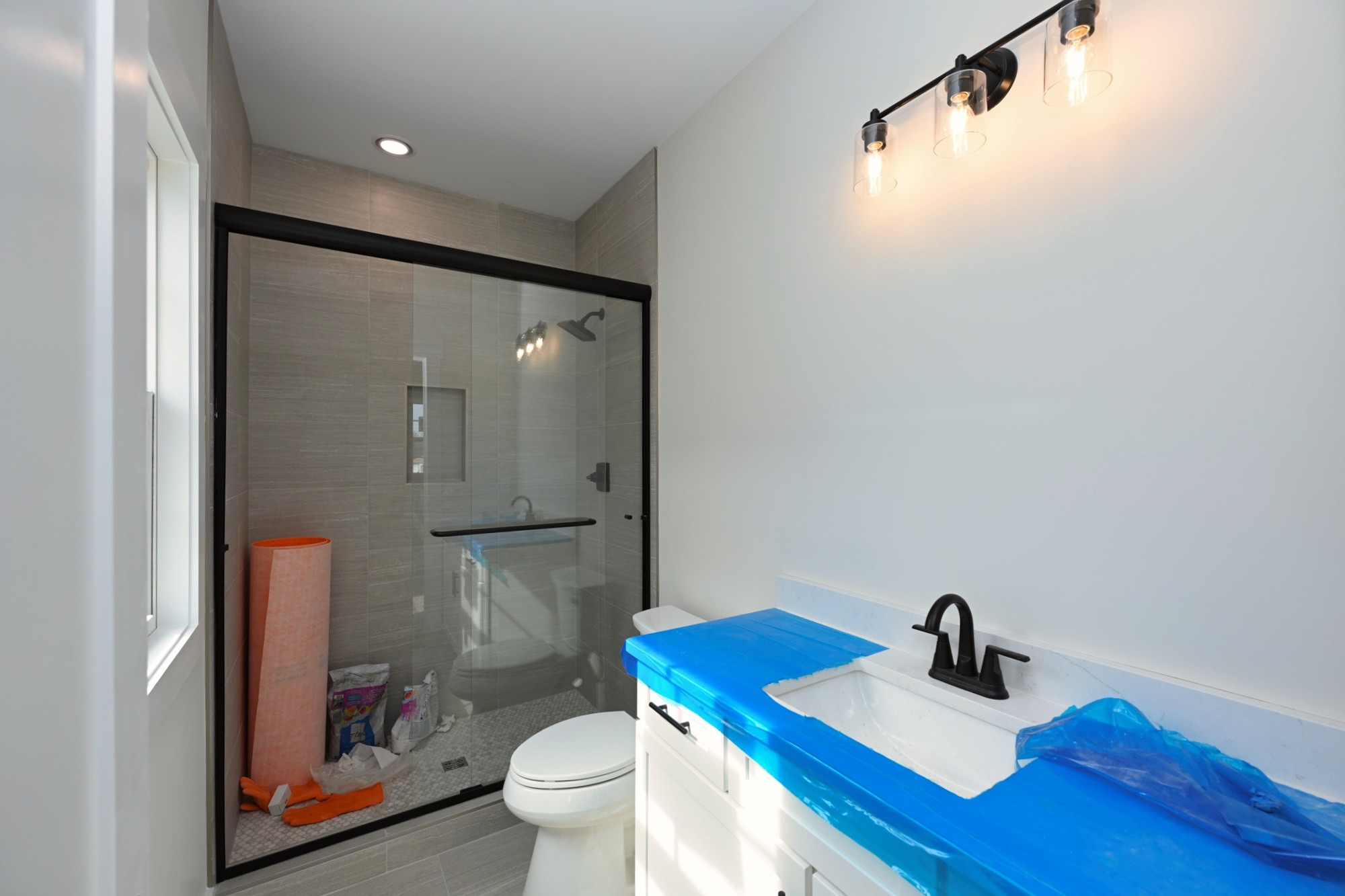 1204 Sylvia Drive Madison, TN 37115 - Photo 33 of 44 a bathroom with a sink and a mirror