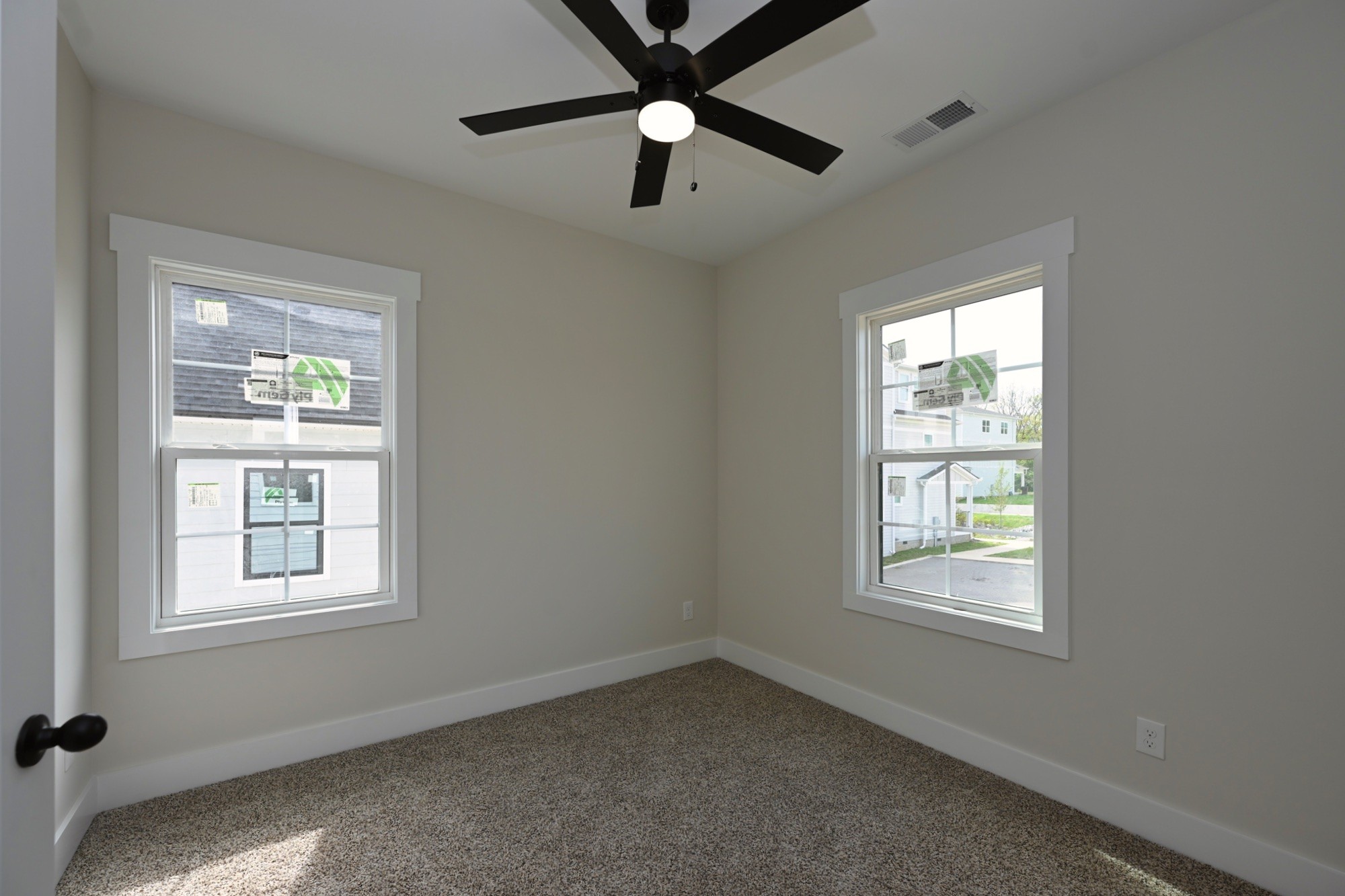 1204 Sylvia Drive Madison, TN 37115 - Photo 38 of 44 an empty room with a window and a fan