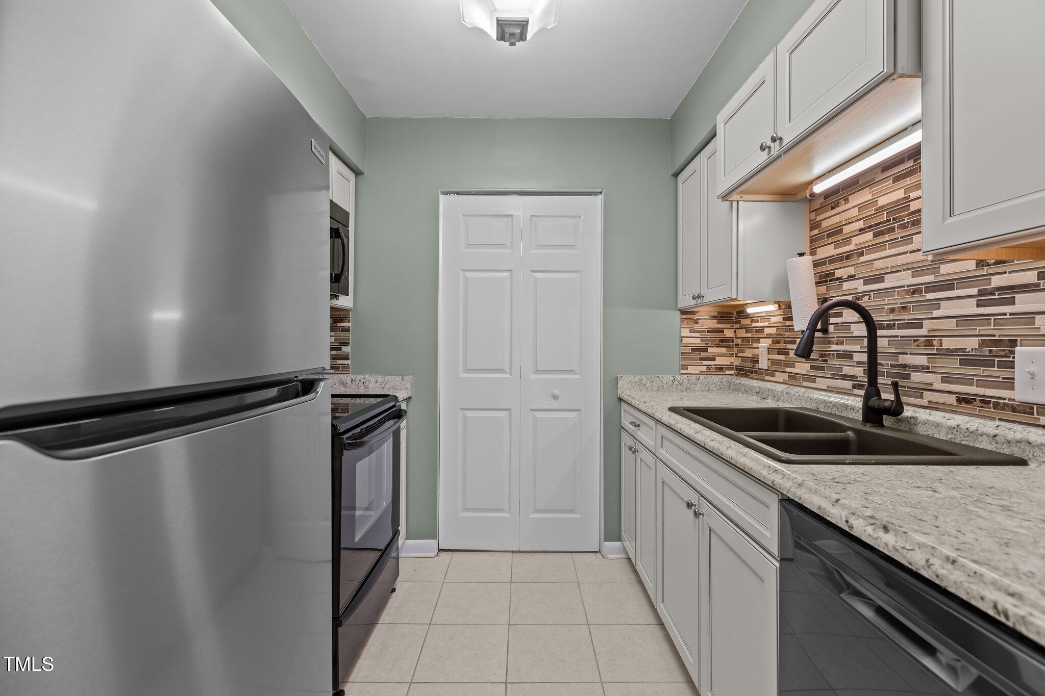 7159 Sandy Creek Drive Raleigh, NC 27615 - Photo 14 of 58 kitchen