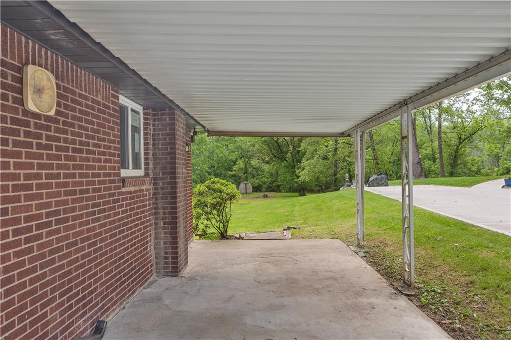 9830 Don Drive Irwin, PA 15642 - Photo 3 of 30 a view of backyard with hardwood and deck