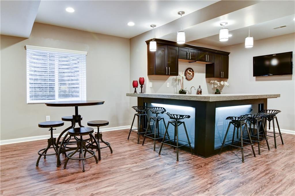 116 Granite Ridge Circle Mars, PA 16046 - Photo 21 of 25 Custom bar with concrete top and under counter lighting....