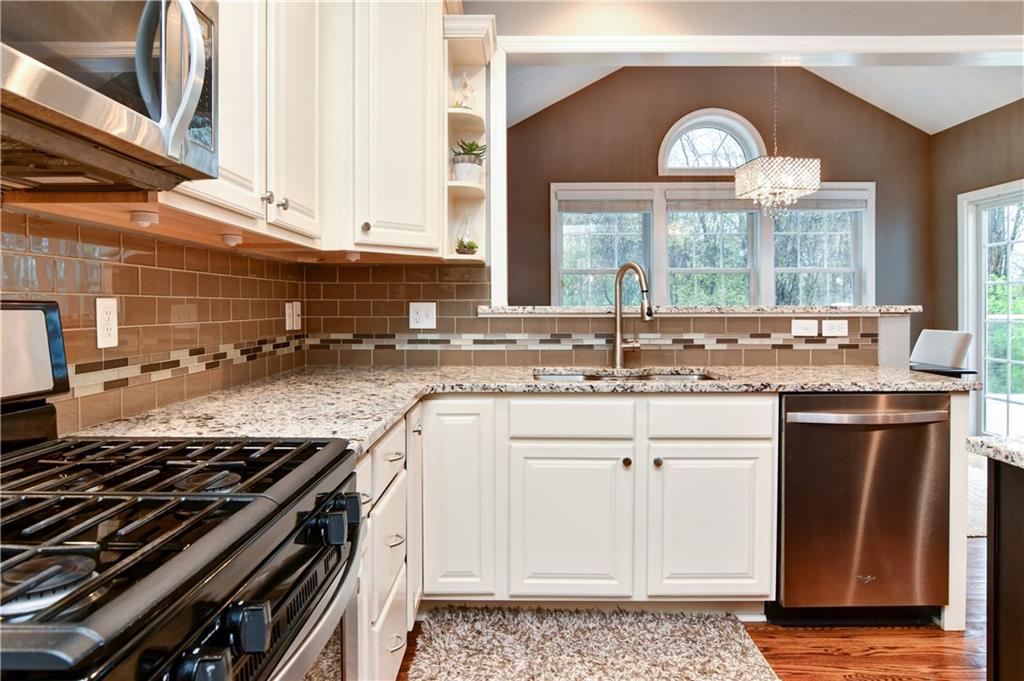 116 Granite Ridge Circle Mars, PA 16046 - Photo 10 of 25 Stainless steel appliances and cream cabinetry make this kitchen light and bright...