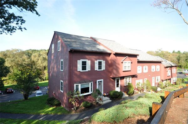 6 Apple Ridge Road, Unit 1 Maynard, MA 01754 - Photo 1 of 14 front view of a house with a yard