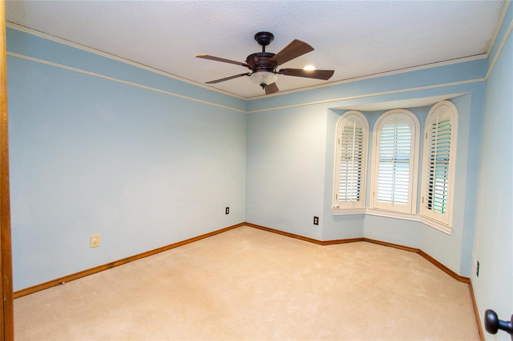 3014 Pecan Ridge Drive Rowlett, TX 75088 - Photo 18 of 29 a view of an empty room with a window
