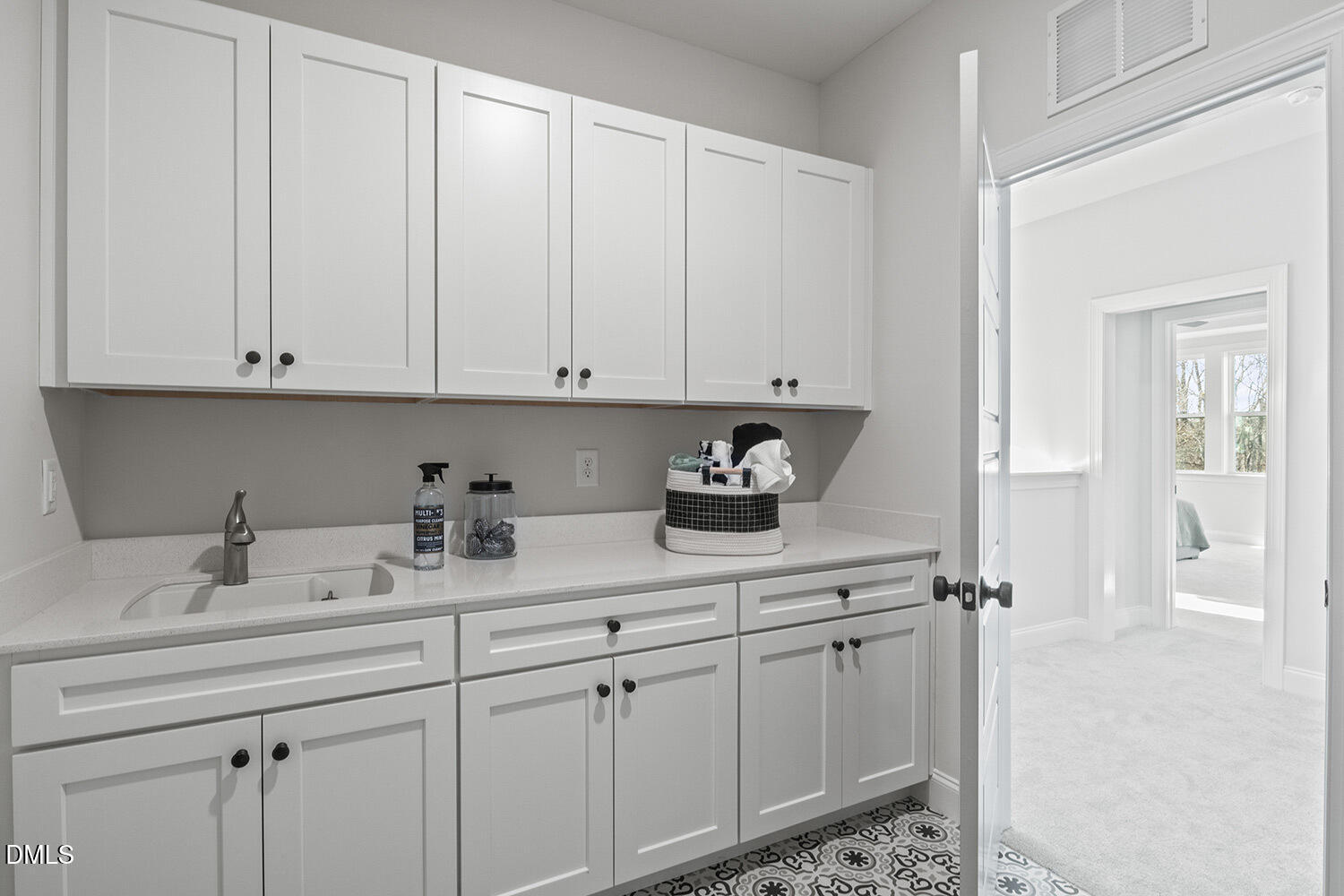 8120 Andrea Lane Raleigh, NC 27613 - Photo 17 of 25 a kitchen with white cabinets and white appliances