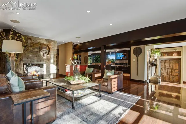 a living room with furniture and a table