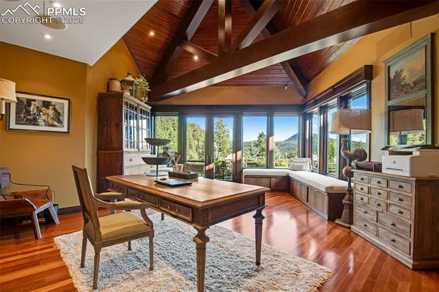 a view of a dining room with furniture window and outside view