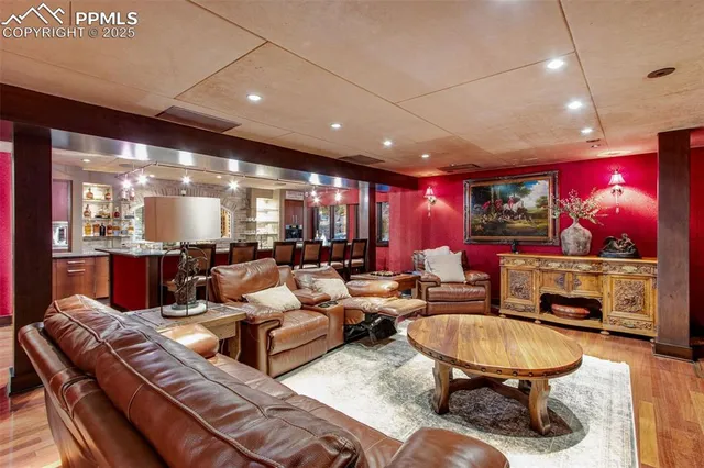 a bathroom with a double vanity sink mirror and bathtub