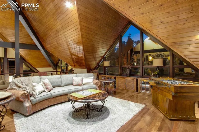 a view of city from a dining room with furniture window and outside view