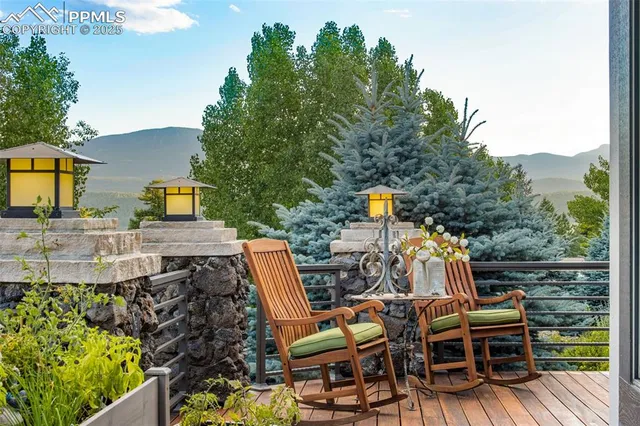 a view of balcony with furniture