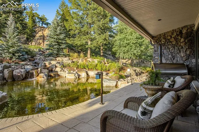 a view of wooden fence and a big yard