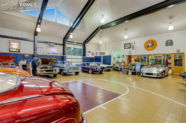 a gym hall with lots of furniture and clutter