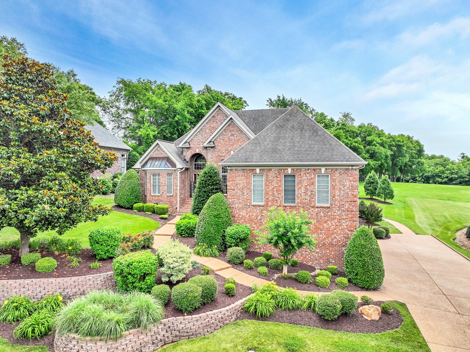423 Ridgecrest Lane Lebanon, TN 37087 - Photo 1 of 65 a house with green field in front of it