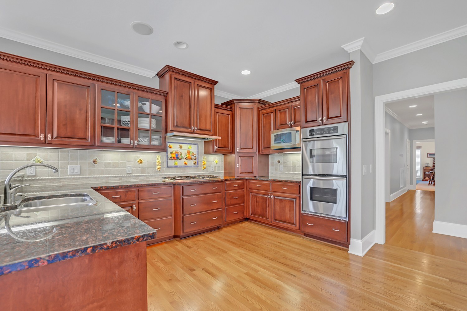 423 Ridgecrest Lane Lebanon, TN 37087 - Photo 15 of 65 a kitchen with stainless steel appliances granite countertop a sink and cabinets