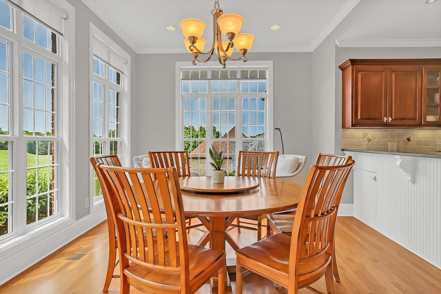 423 Ridgecrest Lane Lebanon, TN 37087 - Photo 19 of 65 a view of a dining room with furniture wooden floor and chandelier