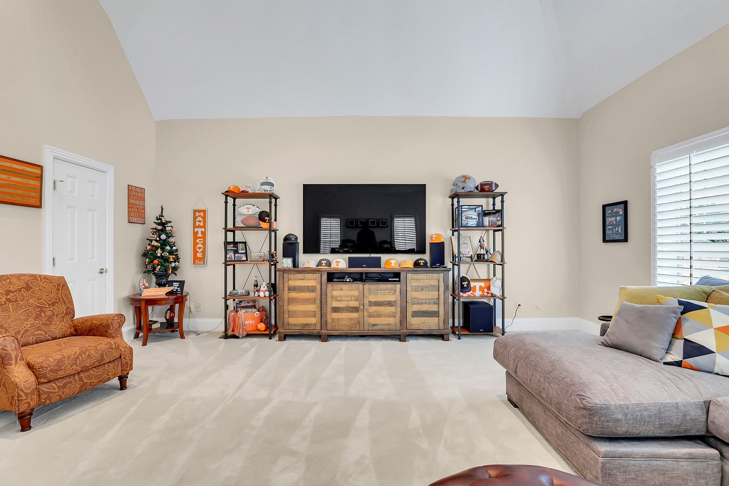 423 Ridgecrest Lane Lebanon, TN 37087 - Photo 39 of 65 a bedroom with furniture and a flat screen tv