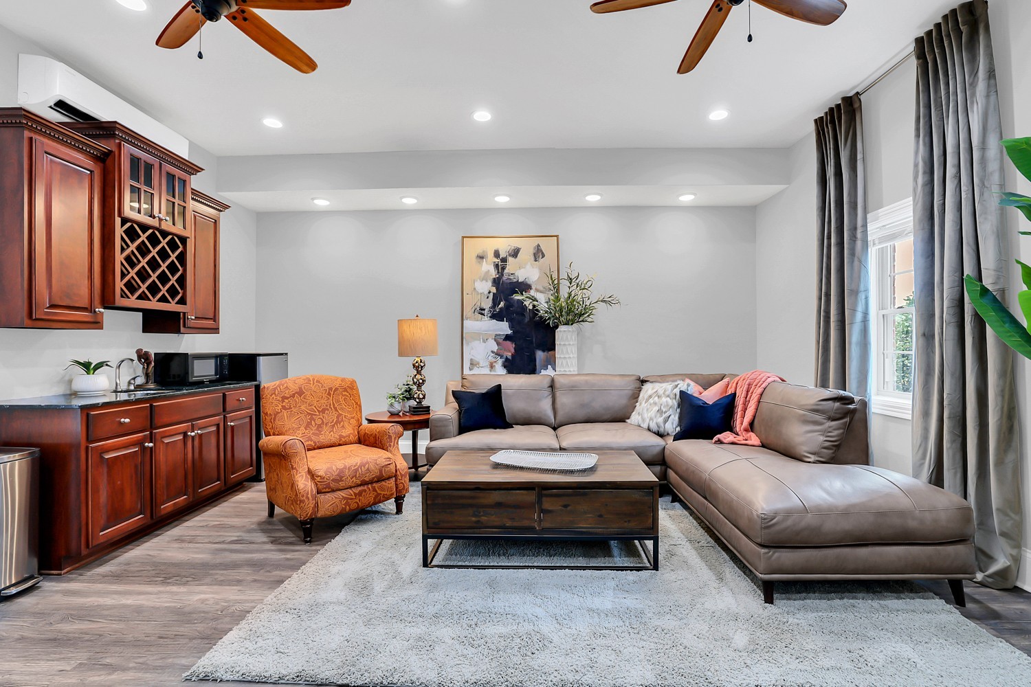 423 Ridgecrest Lane Lebanon, TN 37087 - Photo 43 of 65 a living room with furniture a ceiling fan and a rug