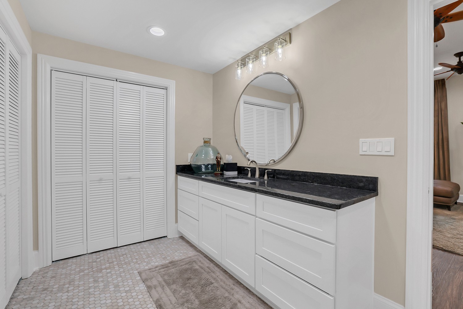 423 Ridgecrest Lane Lebanon, TN 37087 - Photo 48 of 65 a bathroom with a sink and a mirror