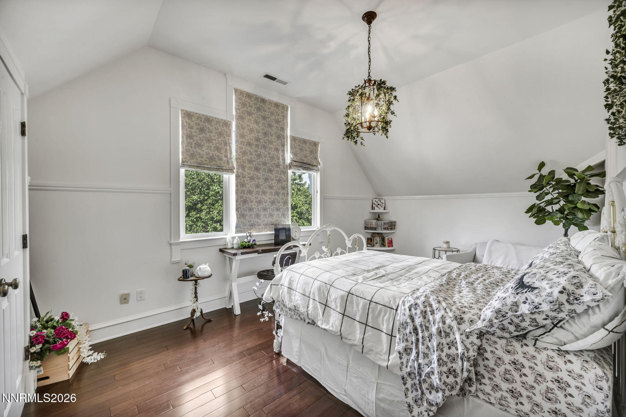 4010 Canyon Drive Reno, NV 89519 - Photo 89 of 147 a bedroom with a bed and a chandelier