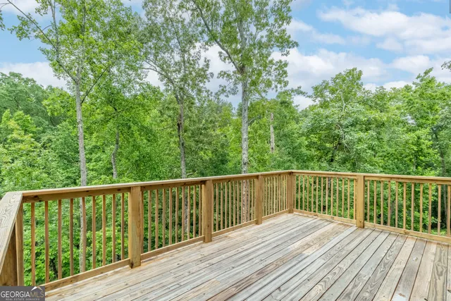 a bathroom with double sink and a mirror