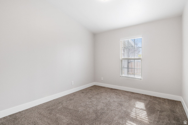 332 Hillgate Way Layton, UT 84041 - Photo 16 of 26 Spare room featuring carpet flooring and baseboards